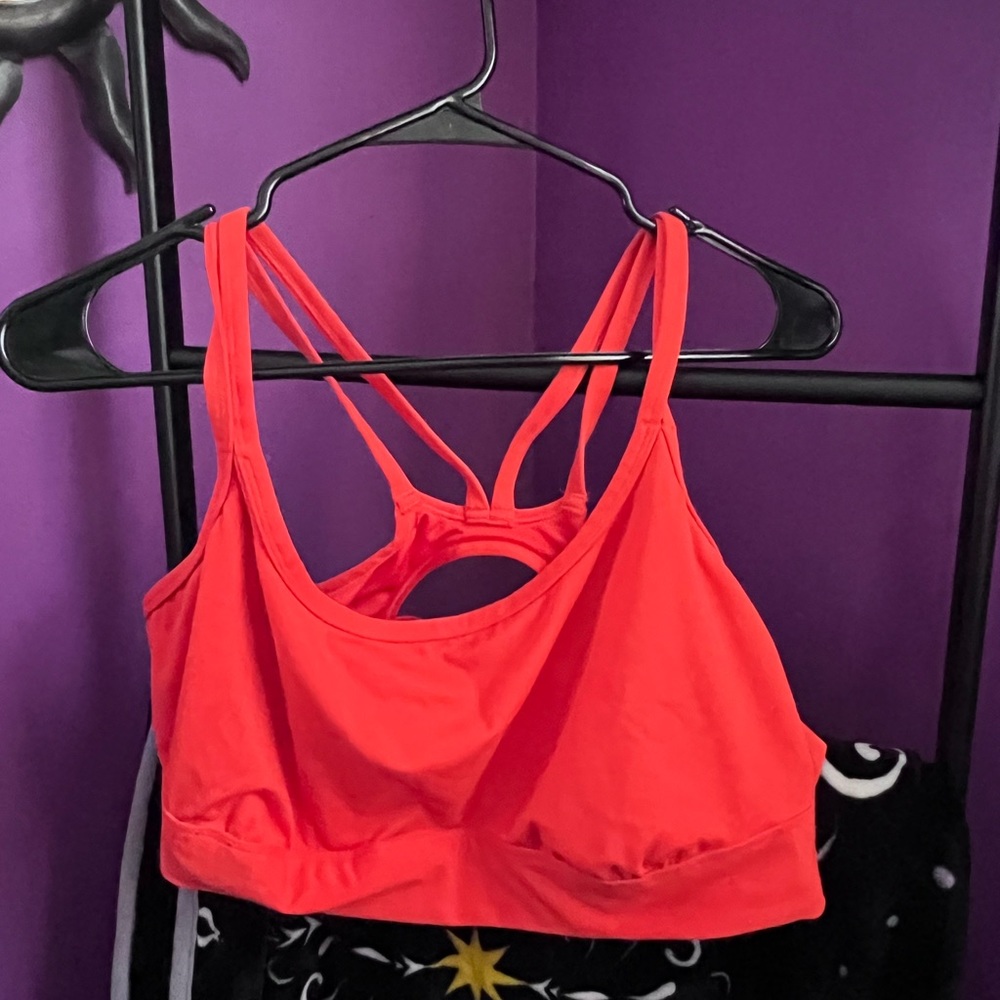 Orange sports bra with removed padding